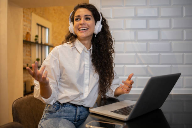 Shot of a young woman working from home